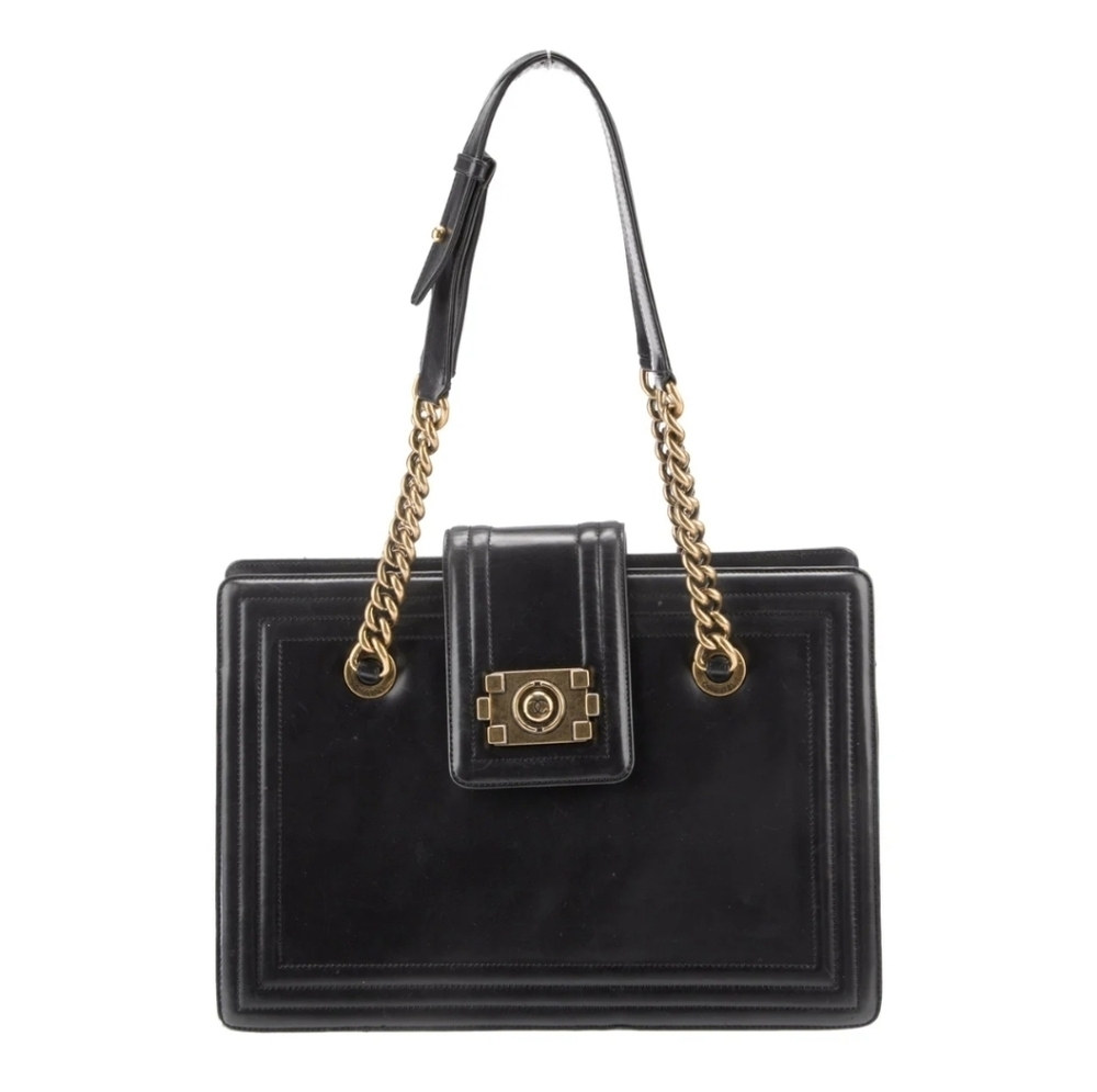 Pre-owned Chanel Boy Tote bag in black leather with gold-tone hardware.